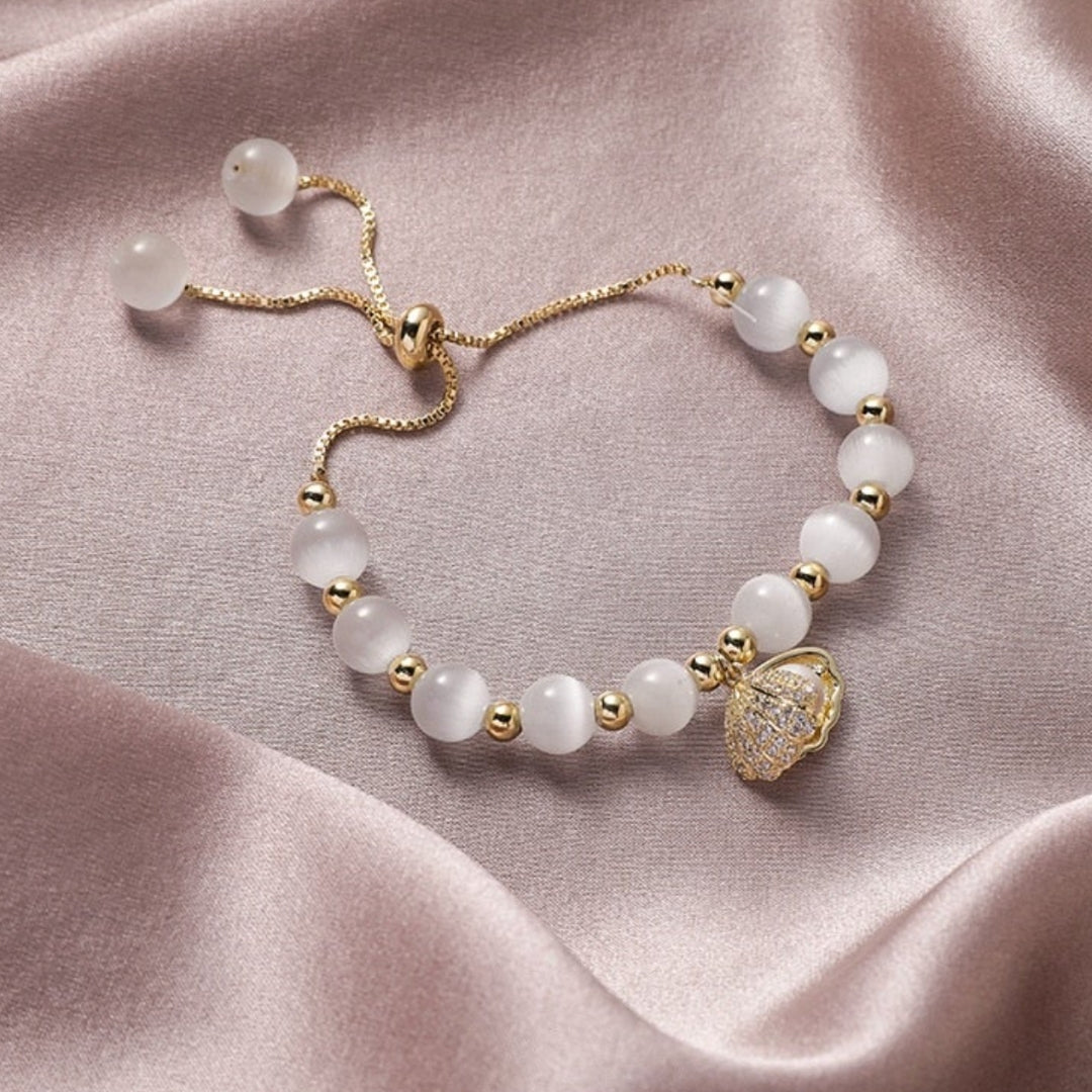 Elegant Adjustable Bracelet with Beads and Gold Zircons