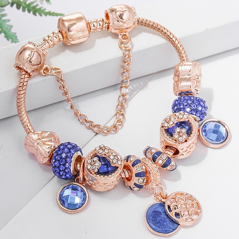 Dazzling rose gold silver bracelet adorned with sparkling blue crystals