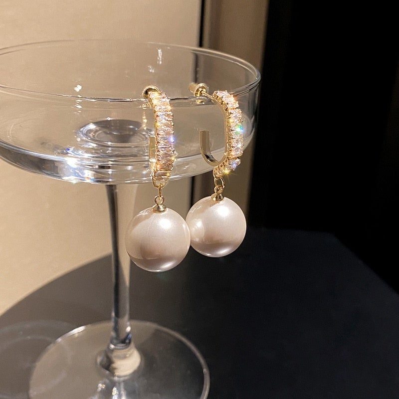 Luxury earrings with pearls and zirconiums