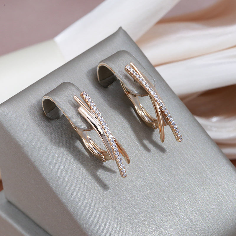 Exquisite Gold Crossed Diamond Earrings